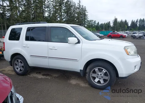 2010 Honda Pilot Touring z USA, uszkodzony, nr VIN 5FNYF4H92AB031653